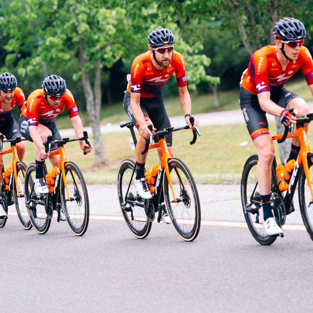 Fort Collins' Chad Haga escorts Kyle Murphy to the win in the men's road race.