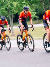 Fort Collins' Chad Haga escorts Kyle Murphy to the win in the men's road race.